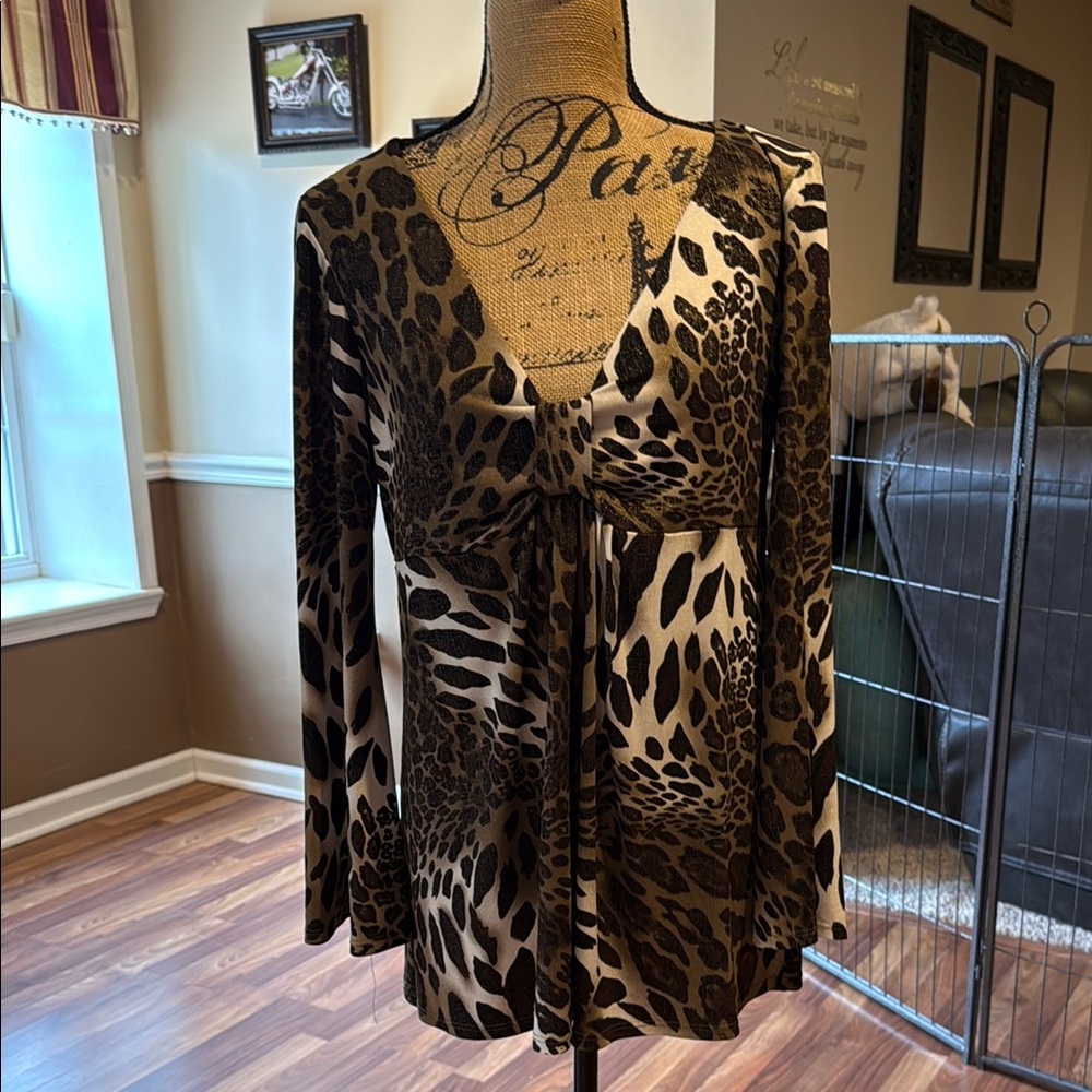 Size large animal print v neck top with gold glitter and bell sleeves